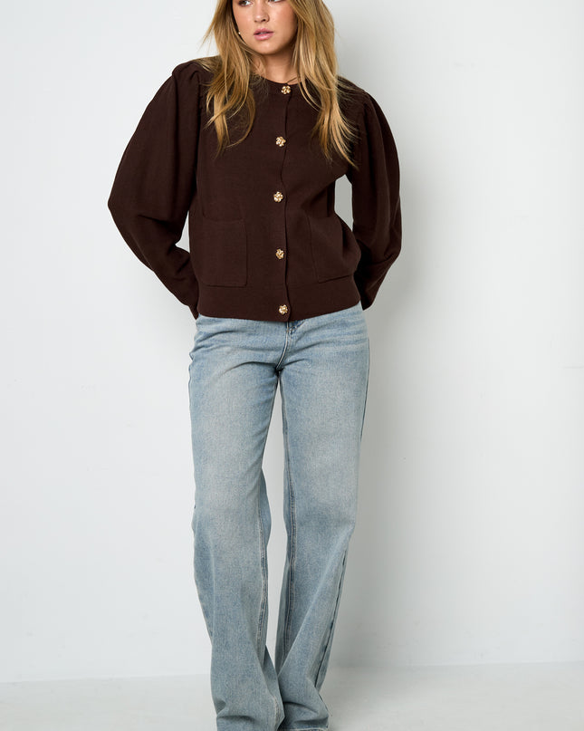 Vest met bloemen knopen