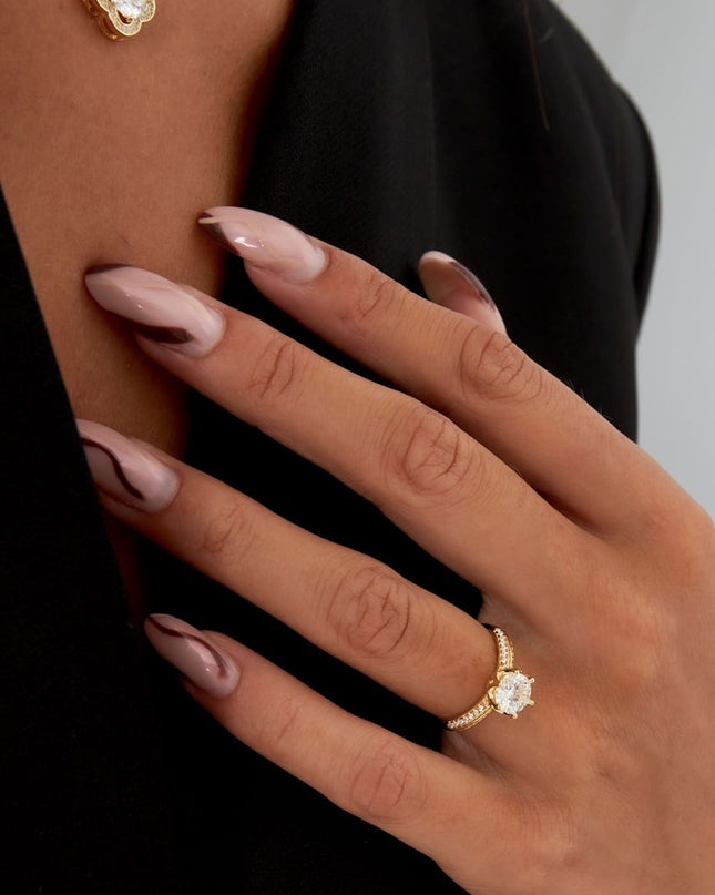 Ring steen met steentjes - Goud kleur - 16