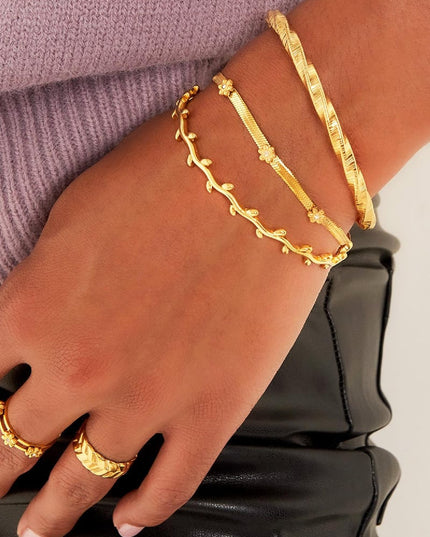 Roestvrijstalen armband met bloemetjes Goud kleur Stainless Steel