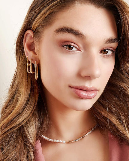 Oorbellen met zirkonia steentjes Paars Koper