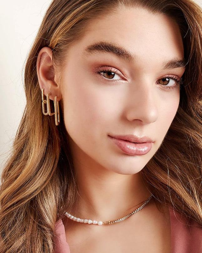 Oorbellen met zirkonia steentjes Paars Koper