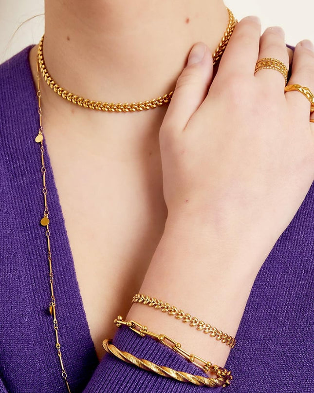 Armband blaadjes Goud kleur Stainless Steel