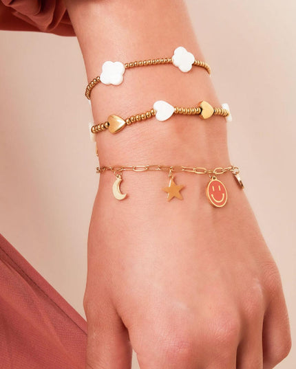 Armband zeeschelp klavertjes Goud kleur Stainless Steel