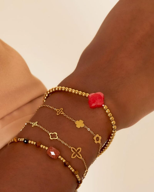 Armband met drie verschillende bloemetjes Zilver Stainless Steel