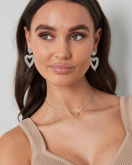 bloem oorbellen met hartvorm hanger