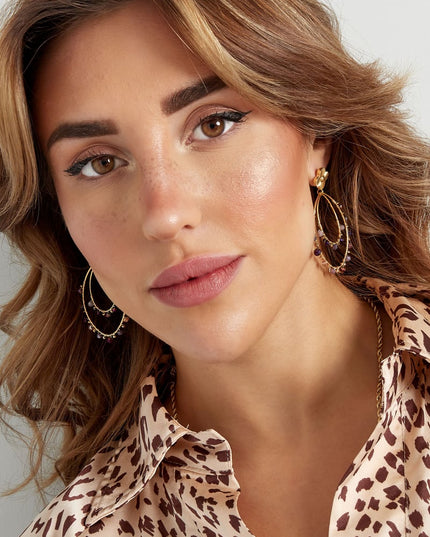 Oorbellen ovaal met kraaltjes - Goud kleur/zwart