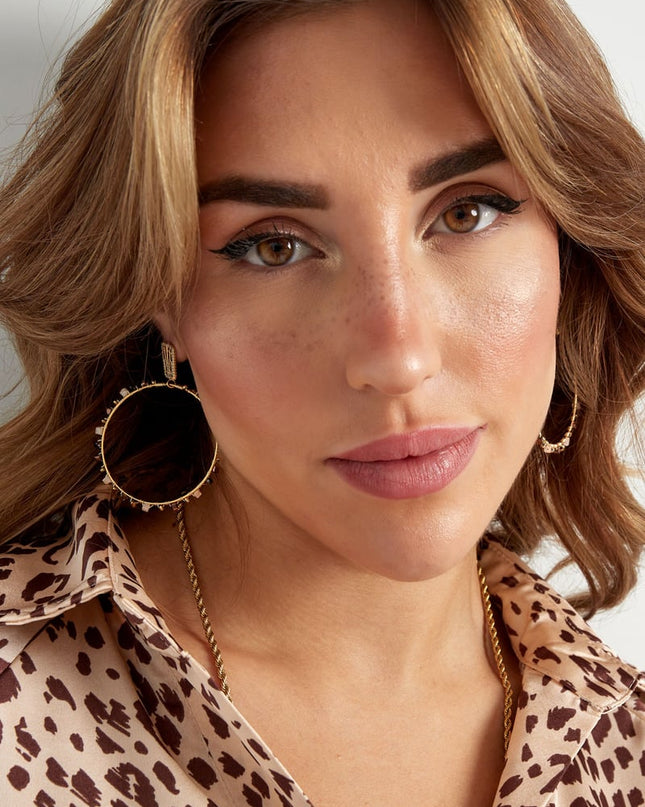 Oorbellen rond met kraaltjes - Goud kleur/blauw