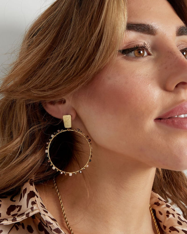 Oorbellen rond met kraaltjes - Goud kleur/blauw