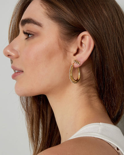 druppel vormige oorbel met steentjes met bolletjes