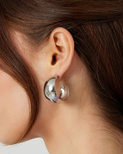 oorbellen geborsteld