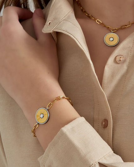 schakel armband met goud/ zilver detail