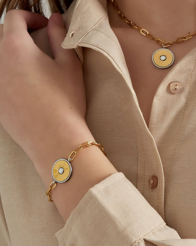 schakel armband met goud/ zilver detail