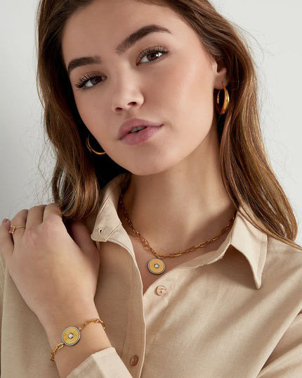 schakel armband met goud/ zilver detail