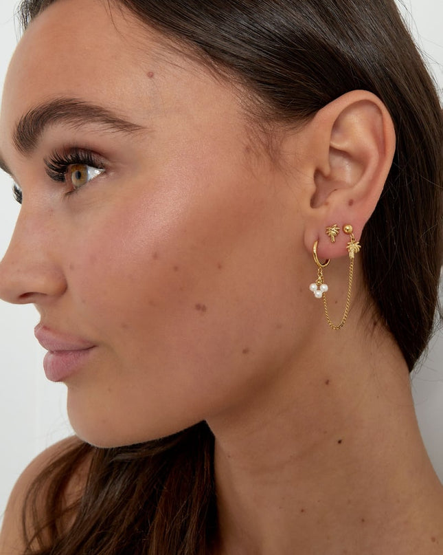 dubbele oorbel met palm en parel