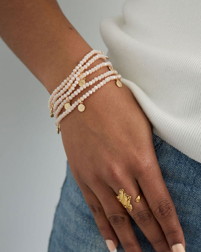 Armbanden met munt bedels