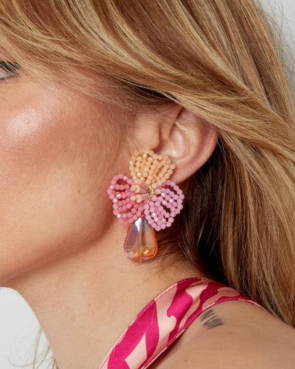 Bloemen oorbellen met parel