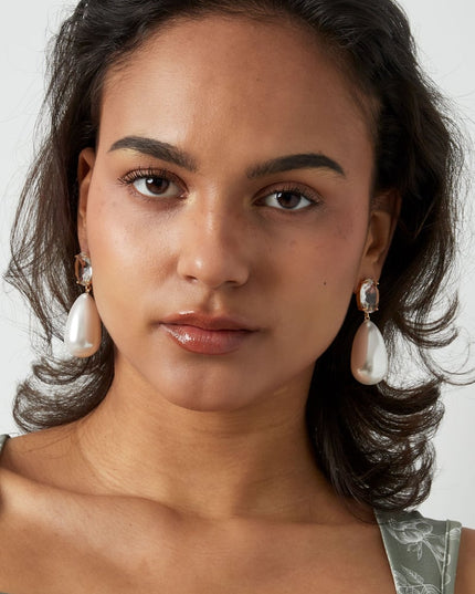 Diamante oorbel met pareldruppel 