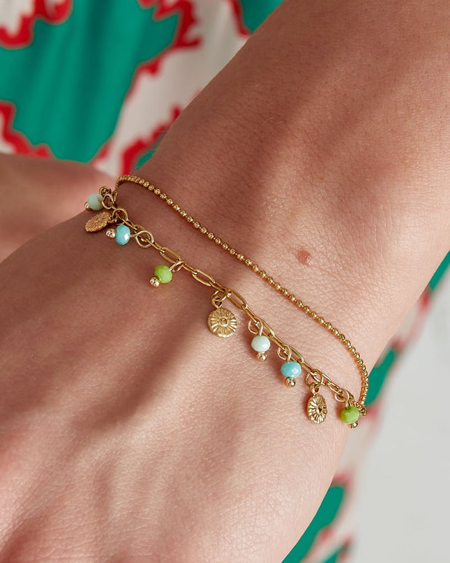 Armband met muntjes en kralen - roze/Goud kleur 