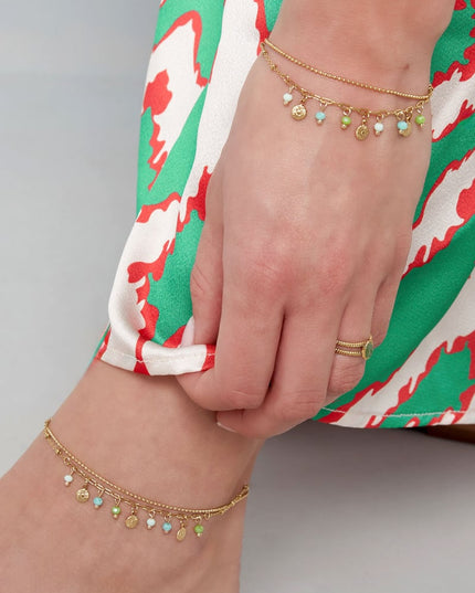 Armband met muntjes en kralen - roze/Goud kleur 