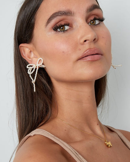 Parel met dubbele strik oorbellen