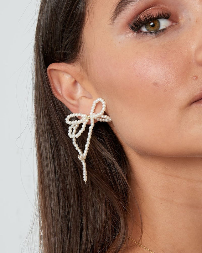 Parel met dubbele strik oorbellen