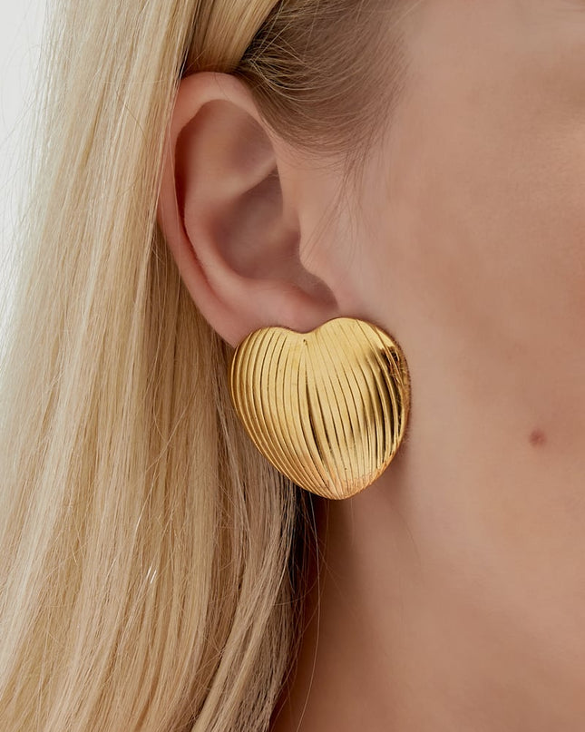 clip oorbellen heart statement