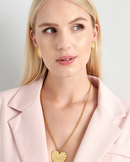 clip oorbellen heart statement