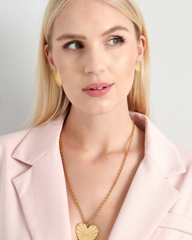 clip oorbellen heart statement