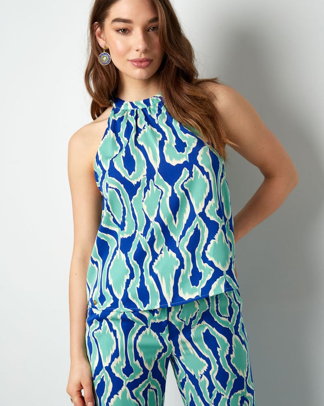 Kleurrijke haltertop met print - oranje/roze 