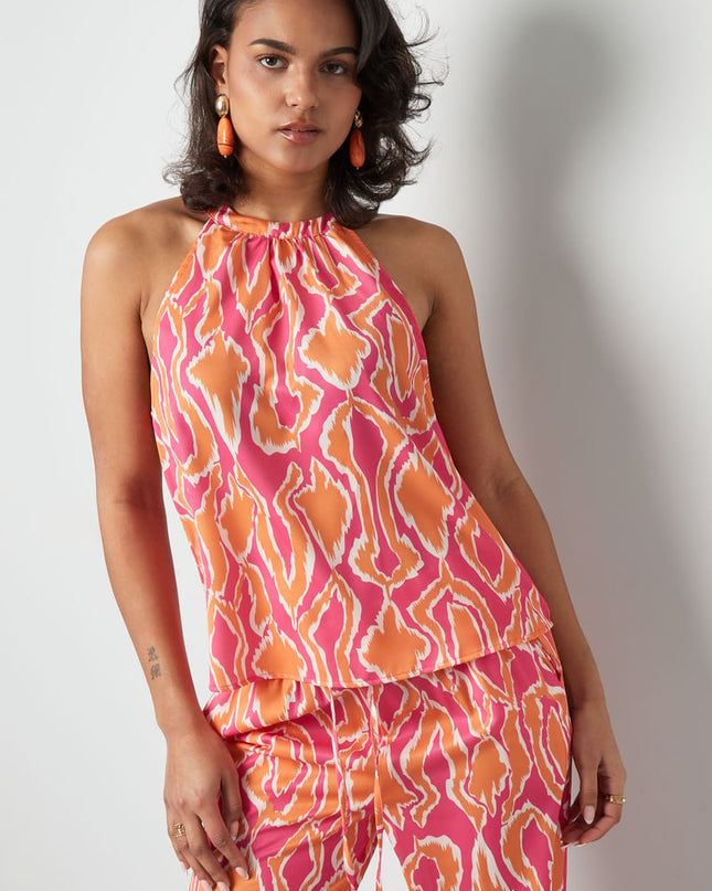 Kleurrijke haltertop met print - oranje/roze 