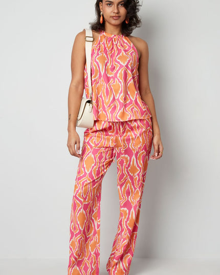 Kleurrijke haltertop met print - oranje/roze 