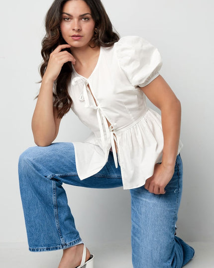 Must-have peplum blouse with bows - black