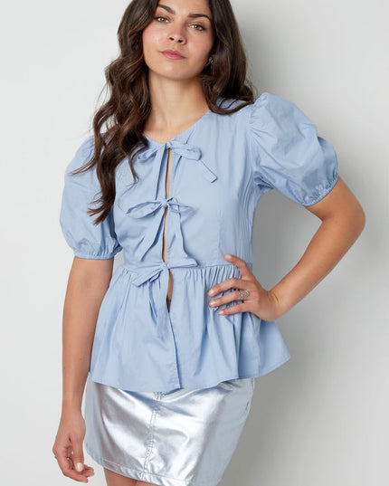 Must-have peplum blouse with bows - black