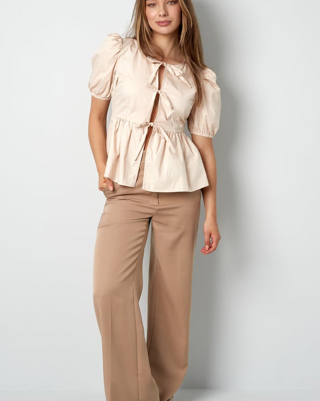 Must-have peplum blouse with bows - black