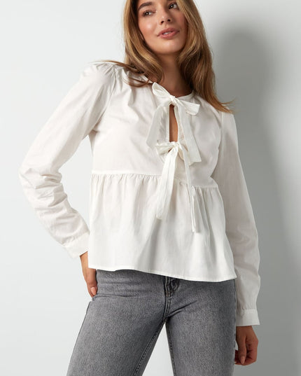 Longsleeve peplum top with bows - beige