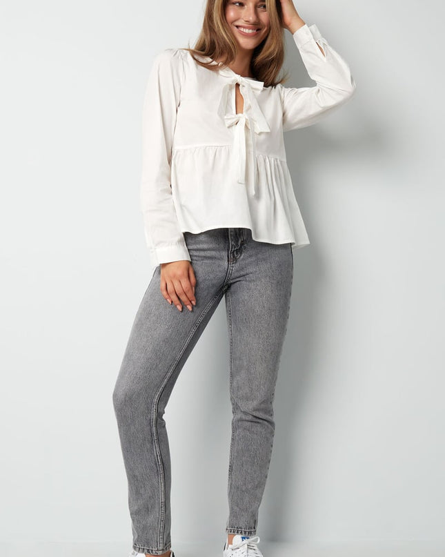 Longsleeve peplum top with bows - beige