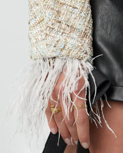 Zacht veren jasje met strikjes - groen