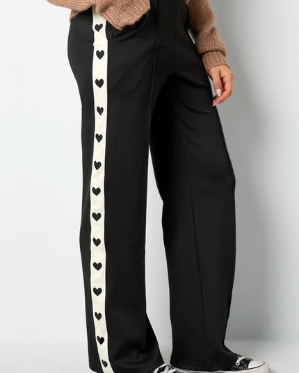 Pants with hearts on the side - red