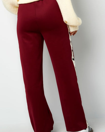 Pants with hearts on the side - red
