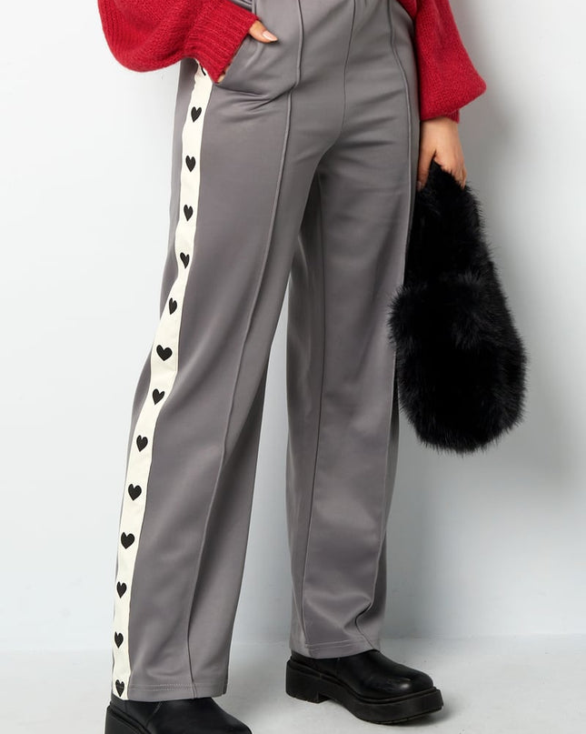 Pants with hearts on the side - red