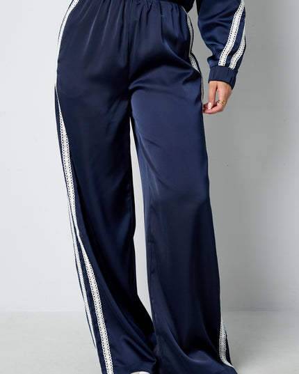 Sportieve broek met satijnen look