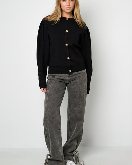 Vest met bloemen knopen