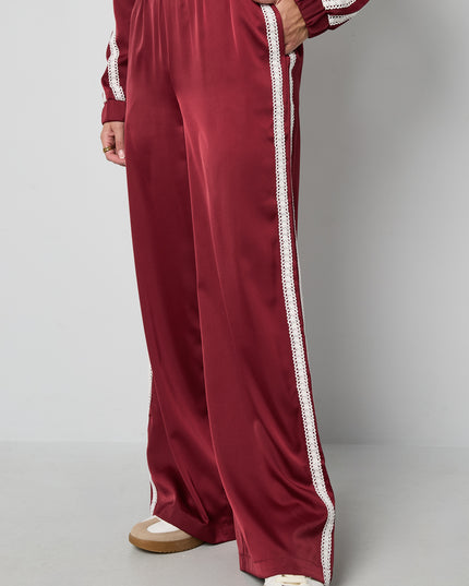 Sportieve broek met satijnen look