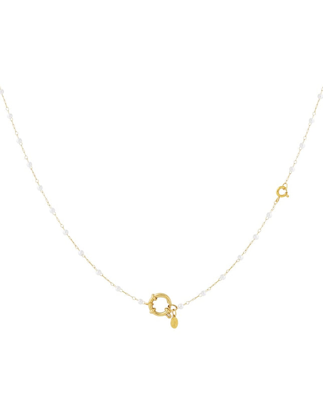 Slot met parelketting