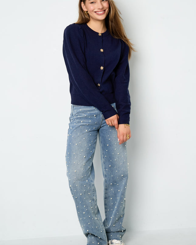 Vest met bloemen knopen