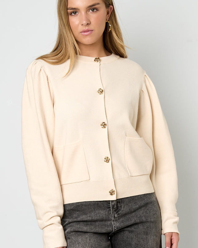 Vest met bloemen knopen