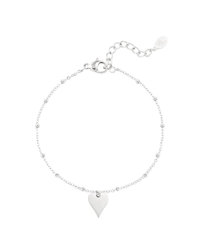 armband met bolletjes en hartbedel