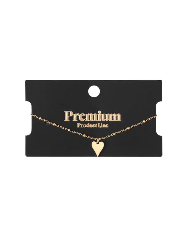 armband met bolletjes en hartbedel