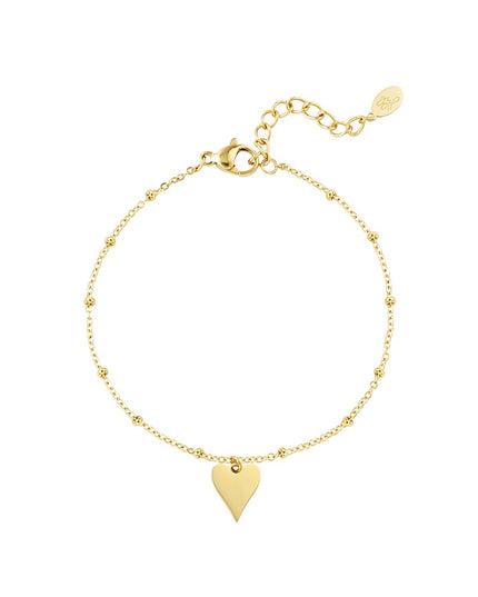 armband met bolletjes en hartbedel