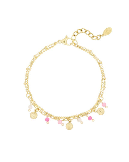 Armband met muntjes en kralen - roze/Goud kleur 